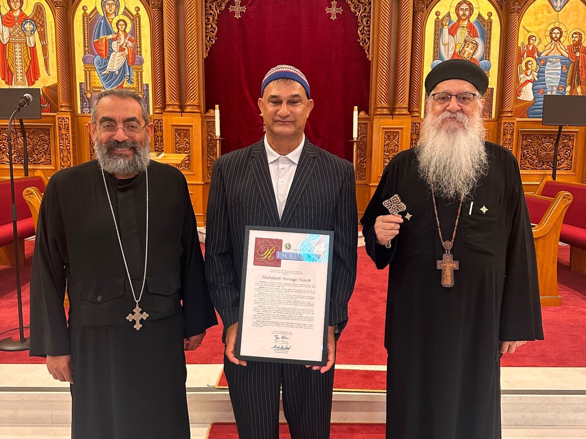 A diverse group of faith and spiritual leaders standing together